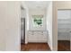 Walk-in pantry featuring built-in cabinets and stainless steel refrigerator at 45 Glen Bend Ct, Spring Lake, NC 28390