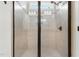 New tile shower with glass doors and window provides natural light at 45 Glen Bend Ct, Spring Lake, NC 28390