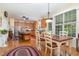 Eat-in kitchen with stainless steel appliances, granite countertops and hardwood flooring at 457 Poplar Forest Ln, Pittsboro, NC 27312