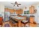 Well-equipped kitchen with stainless steel appliances, center island, and ample cabinet space at 457 Poplar Forest Ln, Pittsboro, NC 27312