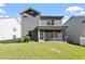Home's backyard features a screened-in porch perfect for entertaining at 4940 Enlightenment Rd, Raleigh, NC 27616