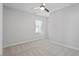 Comfortable bedroom with neutral walls and plush carpeting creates a serene, inviting atmosphere at 4940 Enlightenment Rd, Raleigh, NC 27616