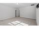 Large bedroom with neutral colors and a lot of natural light at 4940 Enlightenment Rd, Raleigh, NC 27616