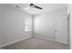 Comfortable bedroom with neutral walls and plush carpeting provides a relaxing and inviting ambiance at 4940 Enlightenment Rd, Raleigh, NC 27616