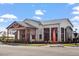 Exterior of HeyDay Brewery + Kitchen with outdoor patio seating on a sunny day at 4940 Enlightenment Rd, Raleigh, NC 27616