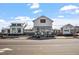 Community Clubhouse Exterior with well maintained landscape at 4940 Enlightenment Rd, Raleigh, NC 27616