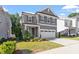 Attractive two-story home with a two-car garage and landscaped front yard at 4940 Enlightenment Rd, Raleigh, NC 27616