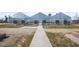Multiple large greenhouses in the community farm with fan ventilation systems at 4940 Enlightenment Rd, Raleigh, NC 27616