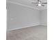 Spacious main bedroom with neutral carpet and ceiling fan at 4940 Enlightenment Rd, Raleigh, NC 27616