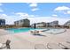 Zero entry community pool featuring lounge chairs and splash pad at 4940 Enlightenment Rd, Raleigh, NC 27616