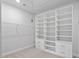 Bright and open walk-in closet with built in shelving at 4940 Enlightenment Rd, Raleigh, NC 27616