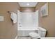 A bright bathroom features a bath and shower combo with white tile at 504 Gumview Cir, Fuquay Varina, NC 27526