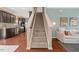 Open foyer with a staircase, leading to a modern kitchen and a comfortable living space at 504 Gumview Cir, Fuquay Varina, NC 27526