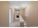 Upstairs hallway with a carpet and two lights in the ceiling at 504 Gumview Cir, Fuquay Varina, NC 27526