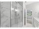 Beautiful bathroom with a tiled shower and a glass door, plus an entry to another room at 515 Historic Dr, Hillsborough, NC 27278