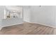 Open-concept space flowing into a bright kitchen with modern appliances at 515 Historic Dr, Hillsborough, NC 27278