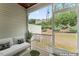 Relaxing screened porch with comfortable seating and peaceful outdoor view at 515 Historic Dr, Hillsborough, NC 27278