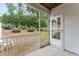Relaxing screened porch with comfortable seating and peaceful outdoor view at 515 Historic Dr, Hillsborough, NC 27278