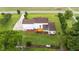 Areal view of large property features mature landscaping and a welcoming backyard deck at 541 Mallie Pearce Rd, Zebulon, NC 27597