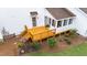 Aerial view of backyard with a painted deck, screened in porch, and established landscaping at 541 Mallie Pearce Rd, Zebulon, NC 27597
