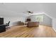 Bright living area offers a ceiling fan, comfortable seating, and natural light at 541 Mallie Pearce Rd, Zebulon, NC 27597