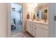 Bathroom features double sink vanity and ensuite bathroom access creating a convenient and private space at 5920 Two Pines Trl, Wake Forest, NC 27587