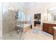 A bathroom featuring glass shower and soaking tub at 5920 Two Pines Trl, Wake Forest, NC 27587