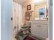 Functional bathroom features a shower-tub combo with curtain and a white vanity with storage at 5920 Two Pines Trl, Wake Forest, NC 27587