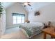 Cozy bedroom features vaulted ceiling, plush carpeting, and floral accents for a comfortable retreat at 5920 Two Pines Trl, Wake Forest, NC 27587