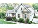 Charming home with a combination of stone and siding, enhanced by lush landscaping at 5920 Two Pines Trl, Wake Forest, NC 27587