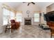 Spacious living room with fireplace, vaulted ceiling, tile floor, and ample natural light at 5920 Two Pines Trl, Wake Forest, NC 27587