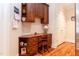 A built in desk and wood cabinets in a light and bright alcove at 5920 Two Pines Trl, Wake Forest, NC 27587