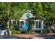 Charming building exterior with large windows, inviting entrance, and lush landscaping at 600 Hedrick Ridge Road # 310 209, Cary, NC 27519