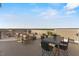 Inviting outdoor seating area featuring stylish patio furniture and distant views at 600 Hedrick Ridge Road # 310 209, Cary, NC 27519