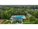 Aerial view of community pool, landscaping and surrounding buildings at 603 Everglades Dr, Mebane, NC 27302