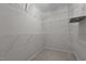 Walk-in closet with white walls and wire shelving at 603 Everglades Dr, Mebane, NC 27302
