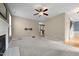 Living room featuring fireplace, fan, and mount for TV at 603 Everglades Dr, Mebane, NC 27302