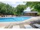 Outdoor swimming pool with lounge chairs in community, perfect for relaxation and social gatherings at 606 Oak Tree Dr, Chapel Hill, NC 27517