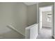 Staircase leads to the second floor hallway and a bedroom at 606 Oak Tree Dr, Chapel Hill, NC 27517