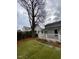 Spacious backyard with a deck and patio, perfect for outdoor entertaining and relaxation at 627 New Road, Raleigh, NC 27608