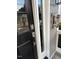 Close-up of a black front door with decorative sidelights and modern hardware at 627 New Road, Raleigh, NC 27608