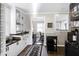 Bright, updated kitchen featuring modern appliances and ample counter space at 627 New Road, Raleigh, NC 27608