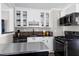 Lovely kitchen featuring modern appliances, plenty of storage, and granite counters at 627 New Road, Raleigh, NC 27608