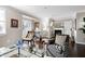 Inviting living room featuring a fireplace, hardwood floors, and neutral paint tones at 627 New Road, Raleigh, NC 27608