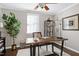 This home office features a live edge desk and bright, natural light at 627 New Road, Raleigh, NC 27608