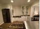 Charming butler's pantry featuring built-in storage and modern appliances at 627 New Road, Raleigh, NC 27608