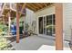 View of the back patio with sliding doors and view of second story deck at 7856 Spungold St, Raleigh, NC 27617