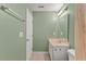 Traditional bathroom featuring white vanity and peach-colored countertop at 7856 Spungold St, Raleigh, NC 27617