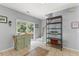 Sun-filled breakfast nook with sliding glass doors to the outdoor deck, creating a seamless indoor-outdoor flow at 7856 Spungold St, Raleigh, NC 27617