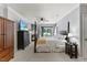 Spacious main bedroom with comfortable bed, tv, fireplace, and closet at 7856 Spungold St, Raleigh, NC 27617